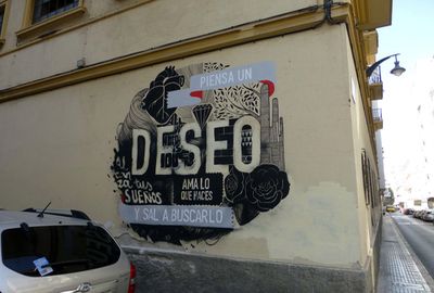 Grafiti del colectivo BOA MISTURA en calle san Lorenzo resturado después de la agresión